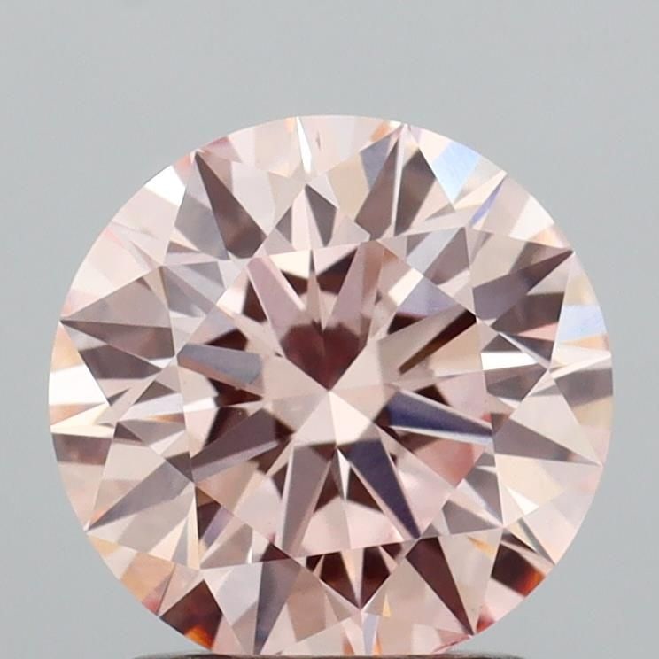 Ideal Loose Diamond - ROUND 1.54ct Fancy Pink VS2: Ideal Loose Diamond - ROUND 1.54ct Fancy Pink VS2 Source: This is a real non-mined Diamond that has been grown in a lab Shape: ROUND Carats: 1.54 Color: Fancy Pink Certification: IGI Video: