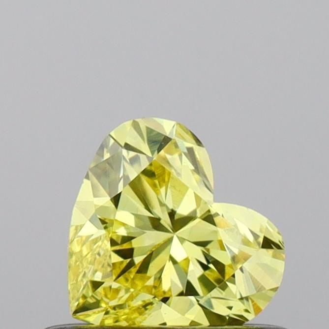 Loose Diamond - HEART 0.44ct Fancy Vivid Yellow VS1: Loose Diamond - HEART 0.44ct Fancy Vivid Yellow VS1 Source: This is a real non-mined Diamond that has been grown in a lab Shape: HEART Carats: 0.44 Color: Fancy Vivid Yellow Certification: IGI Video: