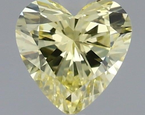 Loose Diamond - HEART 0.73ct Fancy Intense Yellow VS2: Loose Diamond - HEART 0.73ct Fancy Intense Yellow VS2 Source: This is a real non-mined Diamond that has been grown in a lab Shape: HEART Carats: 0.73 Color: Fancy Intense Yellow Certification: IGI Vid