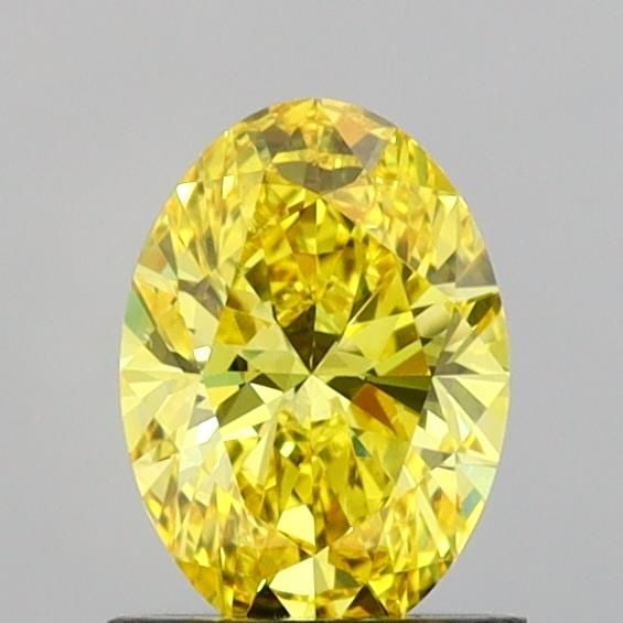 Loose Diamond - OVAL 0.99ct Fancy Vivid Yellow VVS2: Loose Diamond - OVAL 0.99ct Fancy Vivid Yellow VVS2 Source: This is a real non-mined Diamond that has been grown in a lab Shape: OVAL Carats: 0.99 Color: Fancy Vivid Yellow Certification: IGI Video: