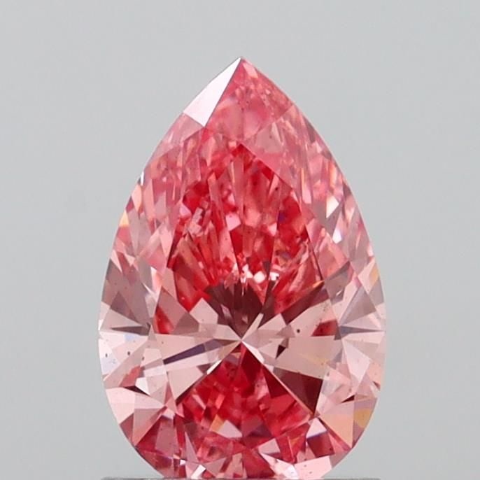 Loose Diamond - PEAR 1.28ct Fancy Vivid Pink VS2: Loose Diamond - PEAR 1.28ct Fancy Vivid Pink VS2 Source: This is a real non-mined Diamond that has been grown in a lab Shape: PEAR Carats: 1.28 Color: Fancy Vivid Pink Certification: IGI Video: