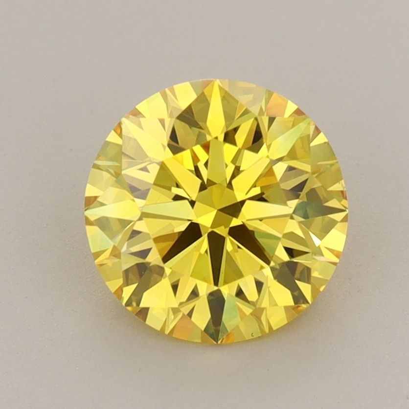 Ideal Loose Diamond - ROUND 1.52ct Fancy Vivid Yellow VS1: Ideal Loose Diamond - ROUND 1.52ct Fancy Vivid Yellow VS1 Source: This is a real non-mined Diamond that has been grown in a lab Shape: ROUND Carats: 1.52 Color: Fancy Vivid Yellow Certification: IGI T