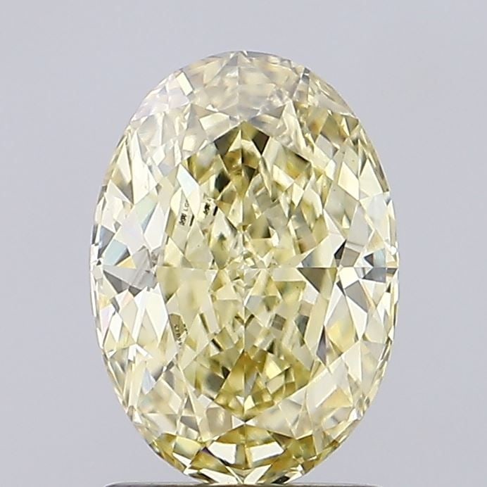 Loose Diamond - OVAL 1.55ct Fancy Intense Yellow VS1: Loose Diamond - OVAL 1.55ct Fancy Intense Yellow VS1 Source: This is a real non-mined Diamond that has been grown in a lab Shape: OVAL Carats: 1.55 Color: Fancy Intense Yellow Certification: IGI Video