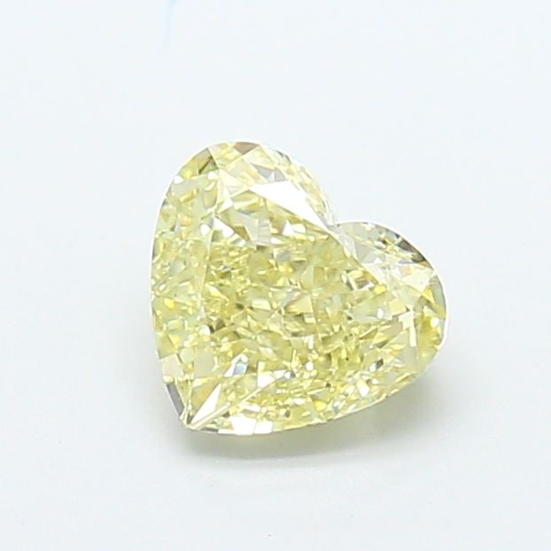 Loose Diamond - HEART 1.26ct Fancy Light Yellow VS1: Loose Diamond - HEART 1.26ct Fancy Light Yellow VS1 Source: This is a real non-mined Diamond that has been grown in a lab Shape: HEART Carats: 1.26 Color: Fancy Light Yellow Certification: IGI Video: