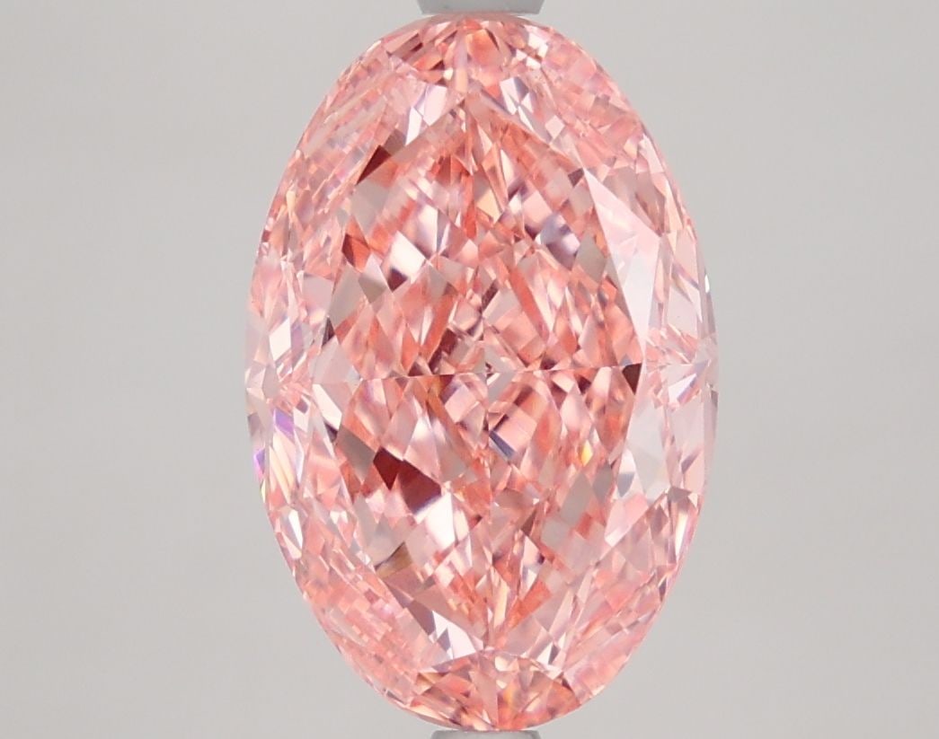 Loose Diamond - OVAL 4.02ct Fancy Vivid Pink VVS2: Loose Diamond - OVAL 4.02ct Fancy Vivid Pink VVS2 Source: This is a real non-mined Diamond that has been grown in a lab Shape: OVAL Carats: 4.02 Color: Fancy Vivid Pink Certification: IGI Video: