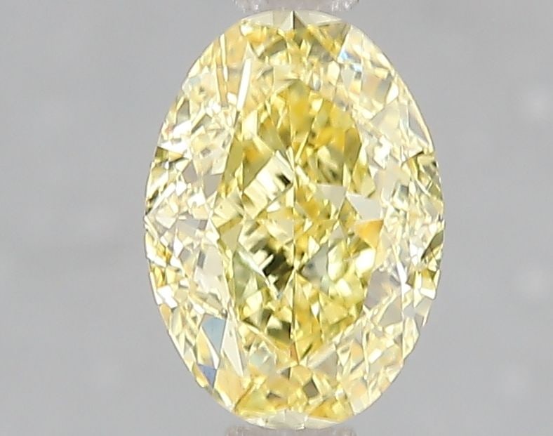 Loose Diamond - OVAL 1.51ct Fancy Vivid Yellow VS2: Loose Diamond - OVAL 1.51ct Fancy Vivid Yellow VS2 Source: This is a real non-mined Diamond that has been grown in a lab Shape: OVAL Carats: 1.51 Color: Fancy Vivid Yellow Certification: IGI Video: