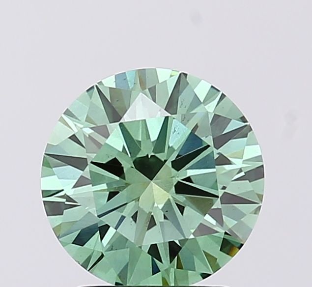 Loose Diamond - ROUND 1.68ct Fancy Vivid Green VS1: Loose Diamond - ROUND 1.68ct Fancy Vivid Green VS1 Source: This is a real non-mined Diamond that has been grown in a lab Shape: ROUND Carats: 1.68 Color: Fancy Vivid Green Certification: IGI Video: