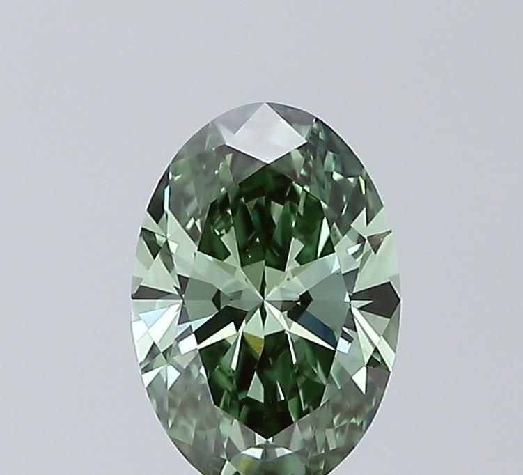 Loose Diamond - OVAL 1.09ct Fancy Vivid Green VS1: Loose Diamond - OVAL 1.09ct Fancy Vivid Green VS1 Source: This is a real non-mined Diamond that has been grown in a lab Shape: OVAL Carats: 1.09 Color: Fancy Vivid Green Certification: IGI Video: