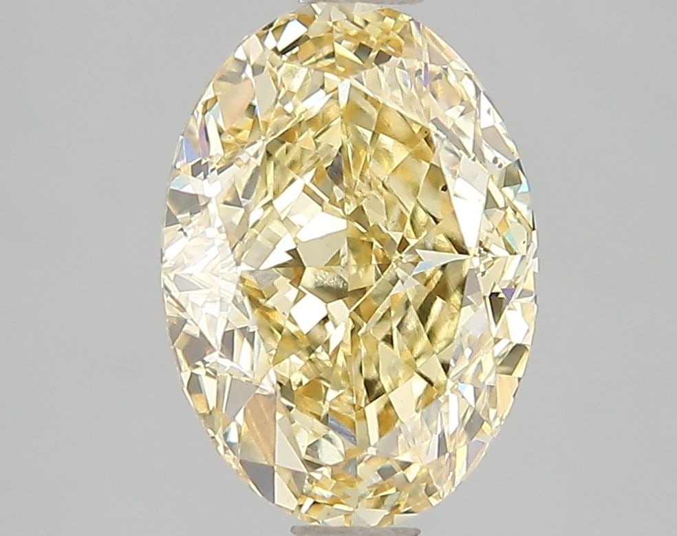 Loose Diamond - OVAL 3.05ct Fancy Vivid Yellow VS2: Loose Diamond - OVAL 3.05ct Fancy Vivid Yellow VS2 Source: This is a real non-mined Diamond that has been grown in a lab Shape: OVAL Carats: 3.05 Color: Fancy Vivid Yellow Certification: IGI Video: