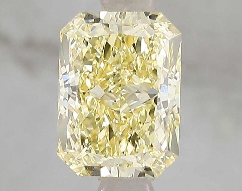 Loose Diamond - RADIANT 1.59ct Fancy Vivid Yellow VS1: Loose Diamond - RADIANT 1.59ct Fancy Vivid Yellow VS1 Source: This is a real non-mined Diamond that has been grown in a lab Shape: RADIANT Carats: 1.59 Color: Fancy Vivid Yellow Certification: IGI Vid