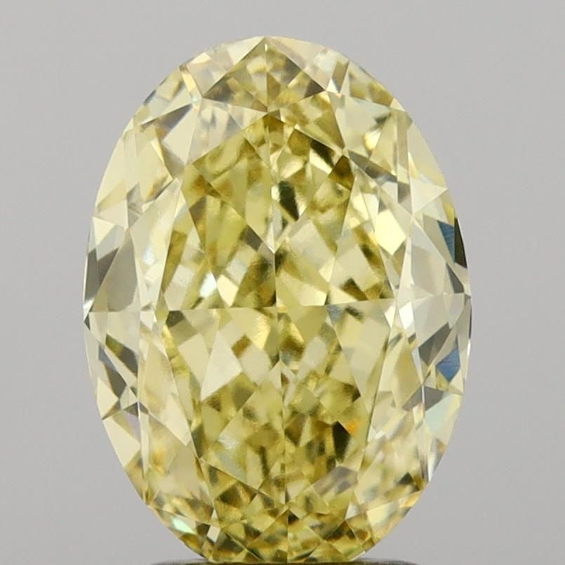 Loose Diamond - OVAL 3.09ct Fancy Yellow VVS2: Loose Diamond - OVAL 3.09ct Fancy Yellow VVS2 Source: This is a real non-mined Diamond that has been grown in a lab Shape: OVAL Carats: 3.09 Color: Fancy Yellow Certification: IGI Video: