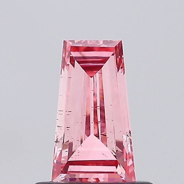 Loose Diamond - TAPERED BAGUETTE 0.53ct Fancy Vivid Pink SI1: Loose Diamond - TAPERED BAGUETTE 0.53ct Fancy Vivid Pink SI1 Source: This is a real non-mined Diamond that has been grown in a lab Shape: TAPERED BAGUETTE Carats: 0.53 Color: Fancy Vivid Pink Certific