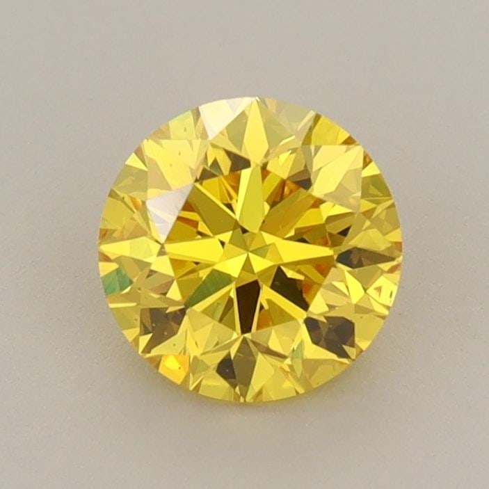 Loose Diamond - ROUND 0.83ct Fancy Vivid Yellow VS2: Loose Diamond - ROUND 0.83ct Fancy Vivid Yellow VS2 Source: This is a real non-mined Diamond that has been grown in a lab Shape: ROUND Carats: 0.83 Color: Fancy Vivid Yellow Certification: IGI Video: