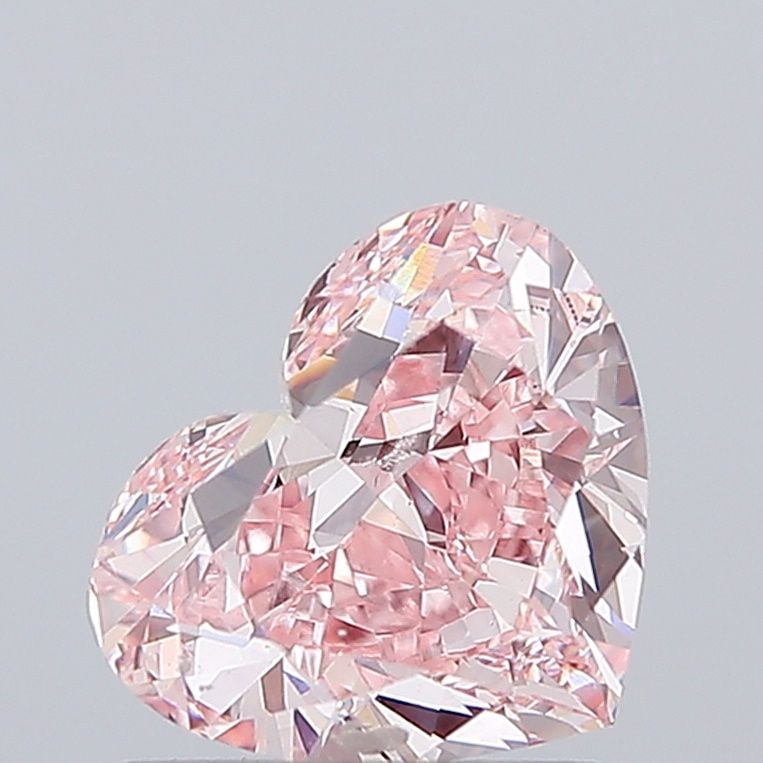 Loose Diamond - HEART 1.5ct Fancy Vivid Pink VS1: Loose Diamond - HEART 1.5ct Fancy Vivid Pink VS1 Source: This is a real non-mined Diamond that has been grown in a lab Shape: HEART Carats: 1.5 Color: Fancy Vivid Pink Certification: IGI Video:
