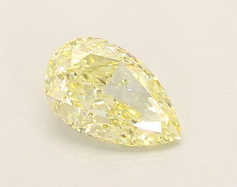 Loose Diamond - PEAR 1.22ct Fancy Yellow VS1: Loose Diamond - PEAR 1.22ct Fancy Yellow VS1 Source: This is a real non-mined Diamond that has been grown in a lab Shape: PEAR Carats: 1.22 Color: Fancy Yellow Certification: IGI Video: