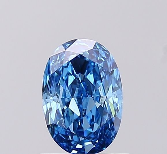 Loose Diamond - OVAL 0.78ct Fancy Vivid Blue VS2: Loose Diamond - OVAL 0.78ct Fancy Vivid Blue VS2 Source: This is a real non-mined Diamond that has been grown in a lab Shape: OVAL Carats: 0.78 Color: Fancy Vivid Blue Certification: IGI Video: