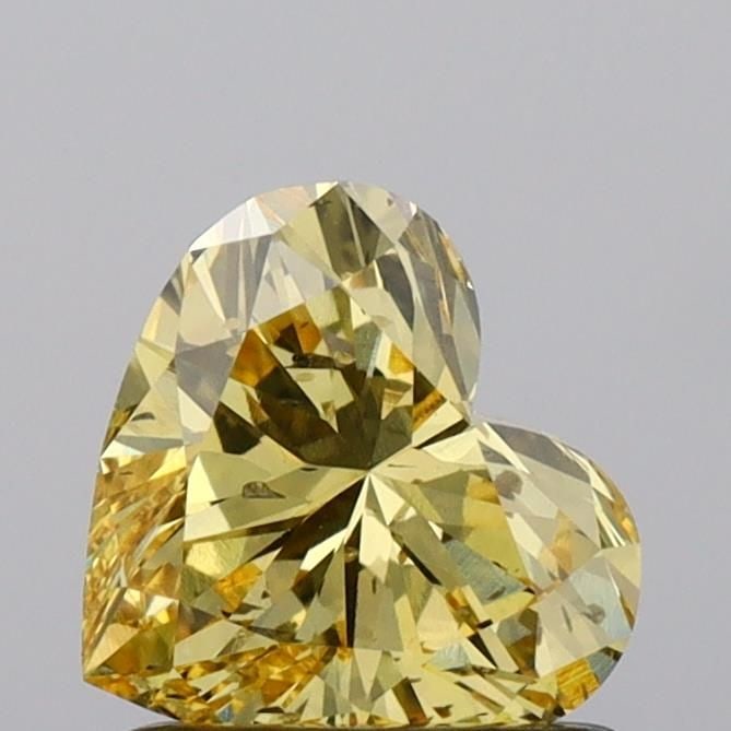 Loose Diamond - HEART 1.04ct Fancy Vivid Yellow SI2: Loose Diamond - HEART 1.04ct Fancy Vivid Yellow SI2 Source: This is a real non-mined Diamond that has been grown in a lab Shape: HEART Carats: 1.04 Color: Fancy Vivid Yellow Certification: IGI Video: