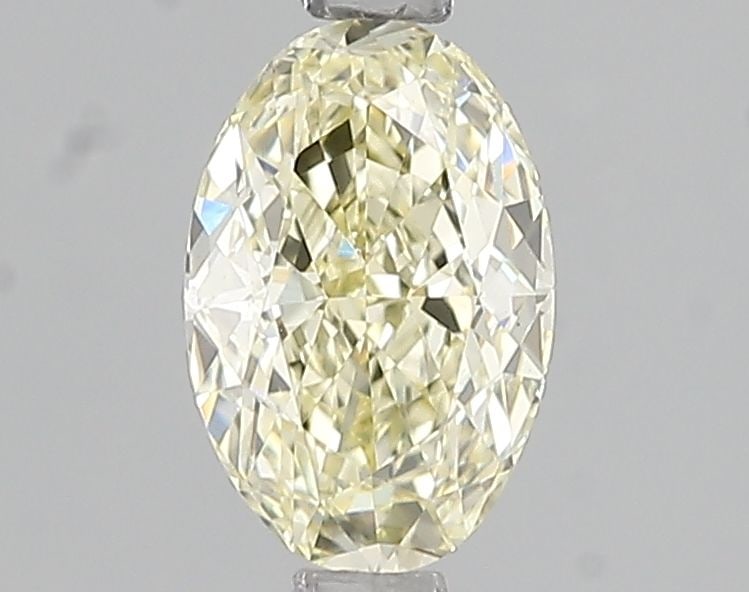Loose Diamond - OVAL 1.09ct Fancy Light Yellow VS1: Loose Diamond - OVAL 1.09ct Fancy Light Yellow VS1 Source: This is a real non-mined Diamond that has been grown in a lab Shape: OVAL Carats: 1.09 Color: Fancy Light Yellow Certification: IGI Video: