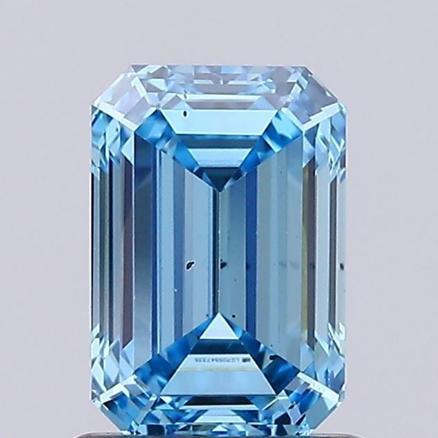 Loose Diamond - EMERALD 1.0ct Fancy Vivid Blue SI1: Loose Diamond - EMERALD 1.0ct Fancy Vivid Blue SI1 Source: This is a real non-mined Diamond that has been grown in a lab Shape: EMERALD Carats: 1.0 Color: Fancy Vivid Blue Certification: IGI Video: