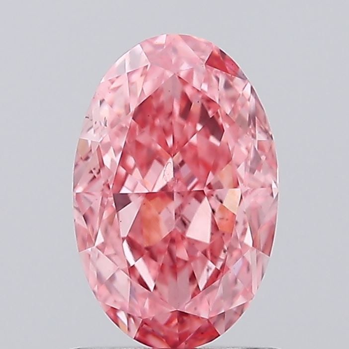 Loose Diamond - OVAL 1.08ct Fancy Vivid Pink VS2: Loose Diamond - OVAL 1.08ct Fancy Vivid Pink VS2 Source: This is a real non-mined Diamond that has been grown in a lab Shape: OVAL Carats: 1.08 Color: Fancy Vivid Pink Certification: IGI Video: