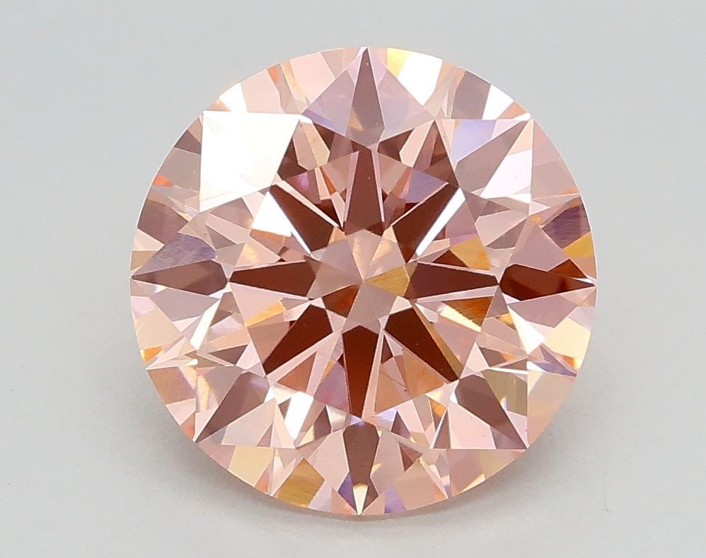 Ideal Loose Diamond - ROUND 2.71ct Fancy Vivid Pink VS1: Ideal Loose Diamond - ROUND 2.71ct Fancy Vivid Pink VS1 Source: This is a real non-mined Diamond that has been grown in a lab Shape: ROUND Carats: 2.71 Color: Fancy Vivid Pink Certification: IGI Video
