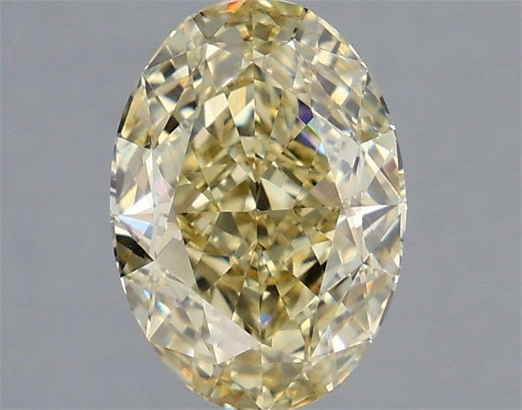 Loose Diamond - OVAL 3.05ct Fancy Light Yellow VVS2: Loose Diamond - OVAL 3.05ct Fancy Light Yellow VVS2 Source: This is a real non-mined Diamond that has been grown in a lab Shape: OVAL Carats: 3.05 Color: Fancy Light Yellow Certification: IGI The Diam