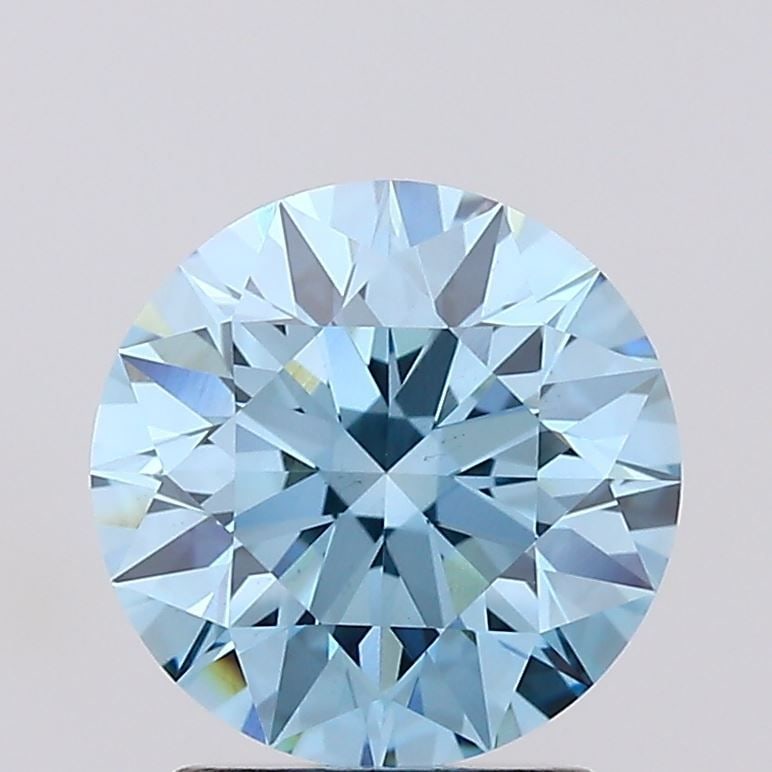 Ideal Loose Diamond - ROUND 2.02ct Fancy Vivid Blue VS1: Ideal Loose Diamond - ROUND 2.02ct Fancy Vivid Blue VS1 Source: This is a real non-mined Diamond that has been grown in a lab Shape: ROUND Carats: 2.02 Color: Fancy Vivid Blue Certification: IGI Video
