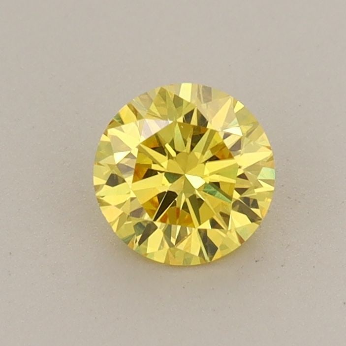 Loose Diamond - ROUND 0.49ct Fancy Vivid Yellow VS1: Loose Diamond - ROUND 0.49ct Fancy Vivid Yellow VS1 Source: This is a real non-mined Diamond that has been grown in a lab Shape: ROUND Carats: 0.49 Color: Fancy Vivid Yellow Certification: IGI Video: