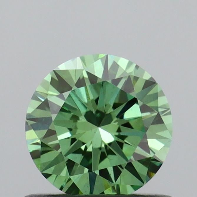 Loose Diamond - ROUND 0.62ct Fancy Vivid Green VS2: Loose Diamond - ROUND 0.62ct Fancy Vivid Green VS2 Source: This is a real non-mined Diamond that has been grown in a lab Shape: ROUND Carats: 0.62 Color: Fancy Vivid Green Certification: IGI Video: