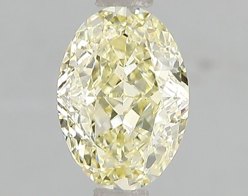 Loose Diamond - OVAL 1.56ct Fancy Yellow VS2: Loose Diamond - OVAL 1.56ct Fancy Yellow VS2 Source: This is a real non-mined Diamond that has been grown in a lab Shape: OVAL Carats: 1.56 Color: Fancy Yellow Certification: IGI Video: