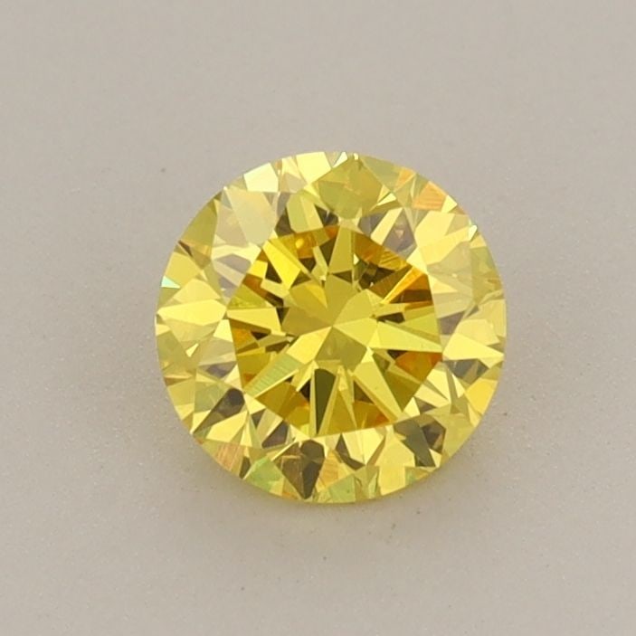 Loose Diamond - ROUND 0.58ct Fancy Vivid Yellow VS2: Loose Diamond - ROUND 0.58ct Fancy Vivid Yellow VS2 Source: This is a real non-mined Diamond that has been grown in a lab Shape: ROUND Carats: 0.58 Color: Fancy Vivid Yellow Certification: IGI Video: