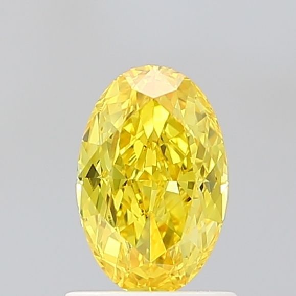 Loose Diamond - OVAL 1.1ct Fancy Vivid Yellow VS1: Loose Diamond - OVAL 1.1ct Fancy Vivid Yellow VS1 Source: This is a real non-mined Diamond that has been grown in a lab Shape: OVAL Carats: 1.1 Color: Fancy Vivid Yellow Certification: IGI Video: