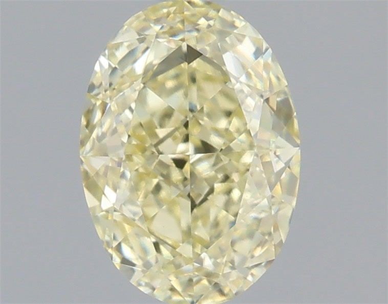 Loose Diamond - OVAL 1.03ct Fancy Light Yellow VVS2: Loose Diamond - OVAL 1.03ct Fancy Light Yellow VVS2 Source: This is a real non-mined Diamond that has been grown in a lab Shape: OVAL Carats: 1.03 Color: Fancy Light Yellow Certification: IGI Video: