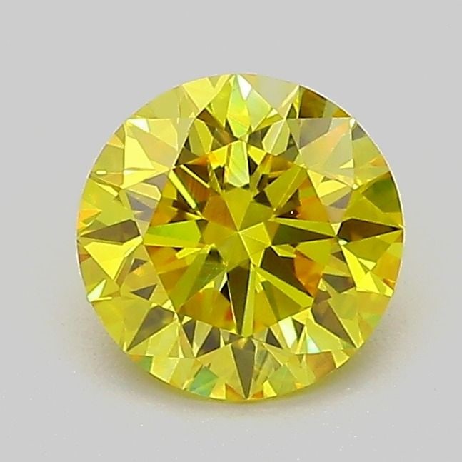 Ideal Loose Diamond - ROUND 1.03ct Fancy Vivid Yellow VVS2: Ideal Loose Diamond - ROUND 1.03ct Fancy Vivid Yellow VVS2 Source: This is a real non-mined Diamond that has been grown in a lab Shape: ROUND Carats: 1.03 Color: Fancy Vivid Yellow Certification: IGI 