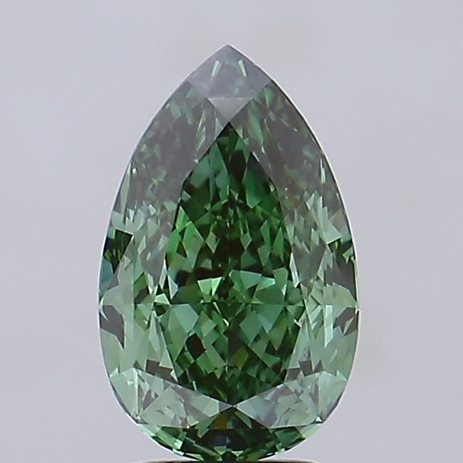 Loose Diamond - PEAR 3.09ct Fancy Vivid Green VVS2: Loose Diamond - PEAR 3.09ct Fancy Vivid Green VVS2 Source: This is a real non-mined Diamond that has been grown in a lab Shape: PEAR Carats: 3.09 Color: Fancy Vivid Green Certification: IGI Video: