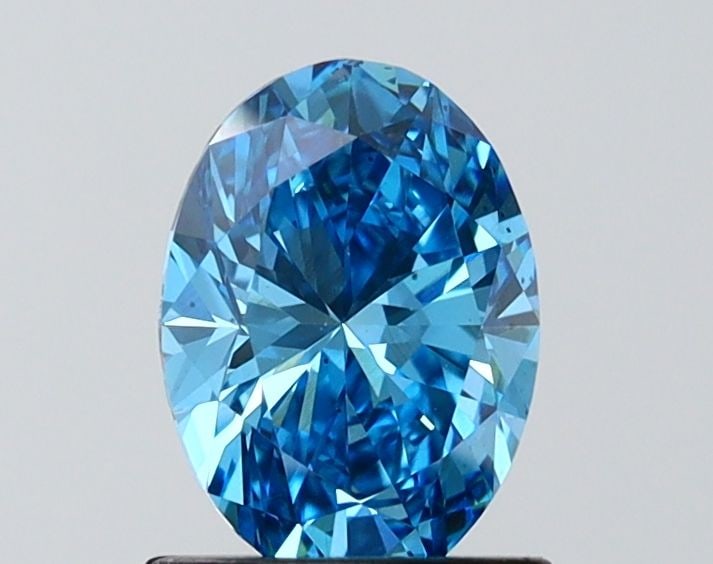Loose Diamond - OVAL 1.02ct Fancy Vivid Blue VS2: Loose Diamond - OVAL 1.02ct Fancy Vivid Blue VS2 Source: This is a real non-mined Diamond that has been grown in a lab Shape: OVAL Carats: 1.02 Color: Fancy Vivid Blue Certification: IGI Video: