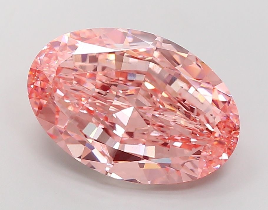 Loose Diamond - OVAL 15.05ct Fancy Vivid Pink VS2: Loose Diamond - OVAL 15.05ct Fancy Vivid Pink VS2 Source: This is a real non-mined Diamond that has been grown in a lab Shape: OVAL Carats: 15.05 Color: Fancy Vivid Pink Certification: IGI Video:
