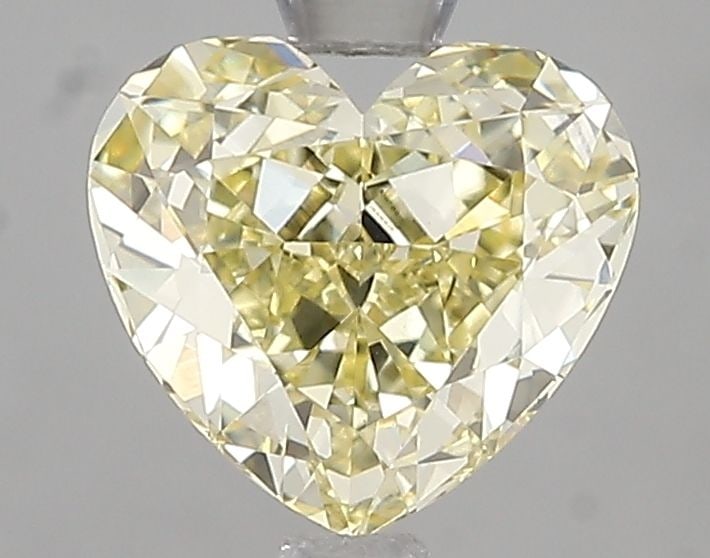 Loose Diamond - HEART 1.55ct Fancy Intense Yellow VVS2: Loose Diamond - HEART 1.55ct Fancy Intense Yellow VVS2 Source: This is a real non-mined Diamond that has been grown in a lab Shape: HEART Carats: 1.55 Color: Fancy Intense Yellow Certification: IGI Vi