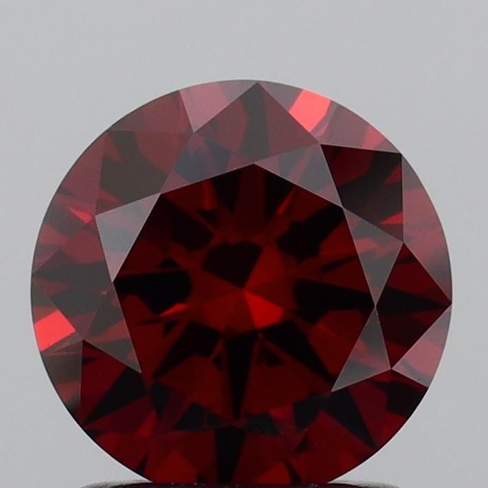 Loose Diamond - ROUND 1.27ct Fancy Deep Orange VS1: Loose Diamond - ROUND 1.27ct Fancy Deep Orange VS1 Source: This is a real non-mined Diamond that has been grown in a lab Shape: ROUND Carats: 1.27 Color: Fancy Deep Orange Certification: IGI Video:
