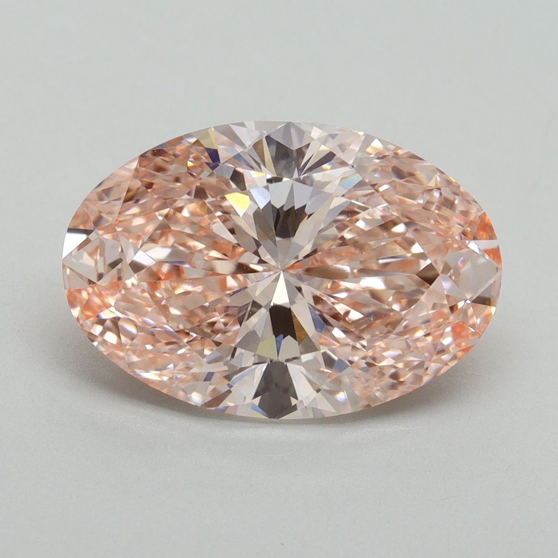 Loose Diamond - OVAL 5.15ct Fancy Vivid Pink VVS2: Loose Diamond - OVAL 5.15ct Fancy Vivid Pink VVS2 Source: This is a real non-mined Diamond that has been grown in a lab Shape: OVAL Carats: 5.15 Color: Fancy Vivid Pink Certification: IGI Video: