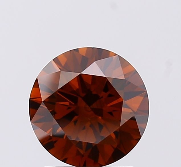 Ideal Loose Diamond - ROUND 1.36ct Fancy Deep Brown VS2: Ideal Loose Diamond - ROUND 1.36ct Fancy Deep Brown VS2 Source: This is a real non-mined Diamond that has been grown in a lab Shape: ROUND Carats: 1.36 Color: Fancy Deep Brown Certification: IGI Video