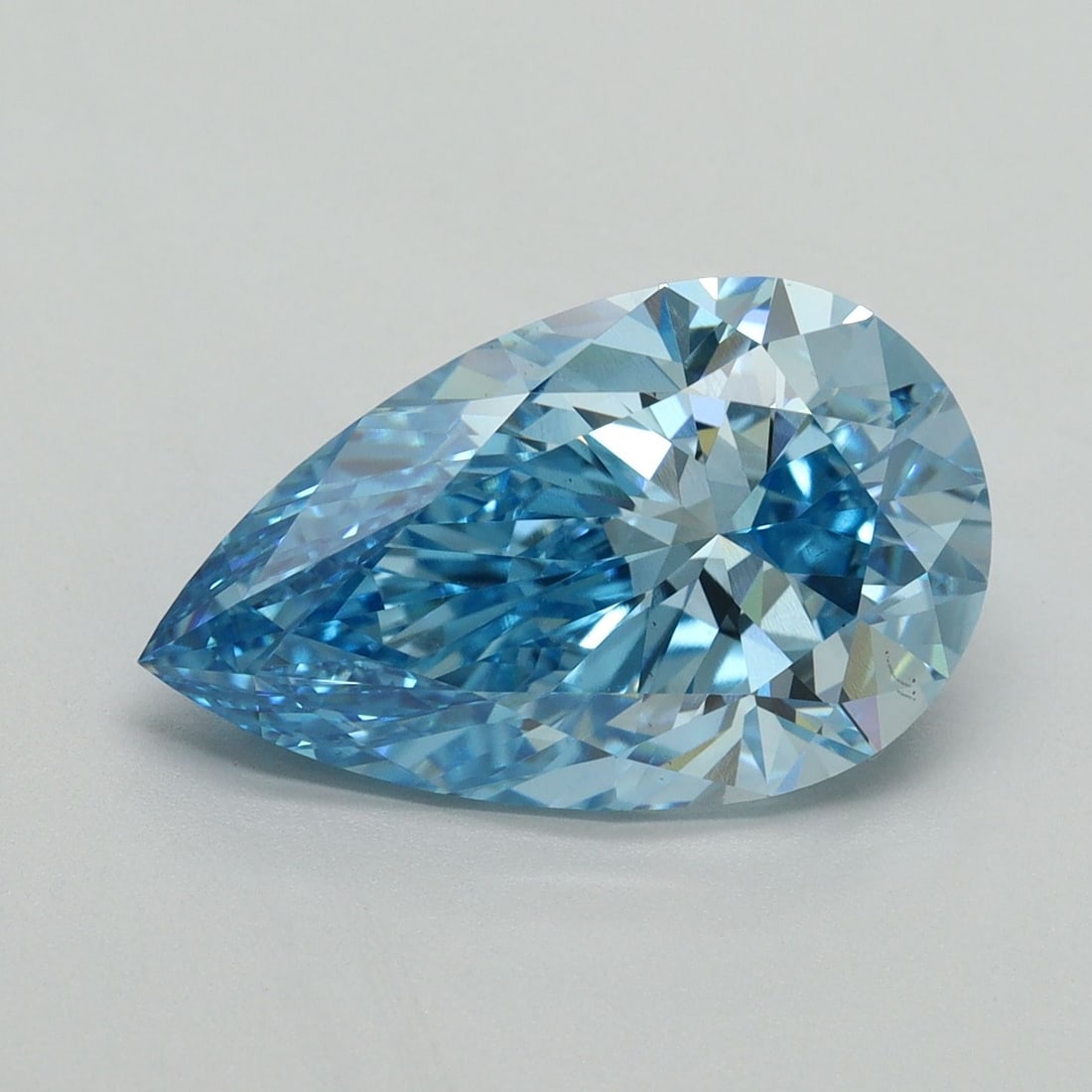 Loose Diamond - PEAR 5.02ct Fancy Vivid Blue VS1: Loose Diamond - PEAR 5.02ct Fancy Vivid Blue VS1 Source: This is a real non-mined Diamond that has been grown in a lab Shape: PEAR Carats: 5.02 Color: Fancy Vivid Blue Certification: IGI Video: