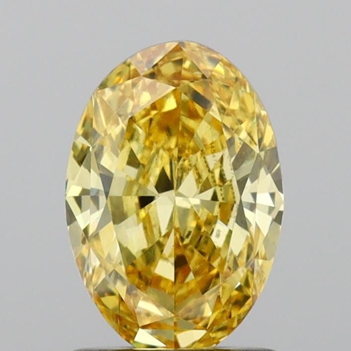Loose Diamond - OVAL 1.21ct Fancy Vivid Yellow VS1: Loose Diamond - OVAL 1.21ct Fancy Vivid Yellow VS1 Source: This is a real non-mined Diamond that has been grown in a lab Shape: OVAL Carats: 1.21 Color: Fancy Vivid Yellow Certification: IGI Video: