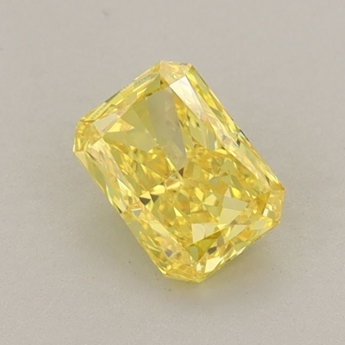 Loose Diamond - RADIANT 0.64ct Fancy Vivid Yellow VVS2: Loose Diamond - RADIANT 0.64ct Fancy Vivid Yellow VVS2 Source: This is a real non-mined Diamond that has been grown in a lab Shape: RADIANT Carats: 0.64 Color: Fancy Vivid Yellow Certification: IGI Vi