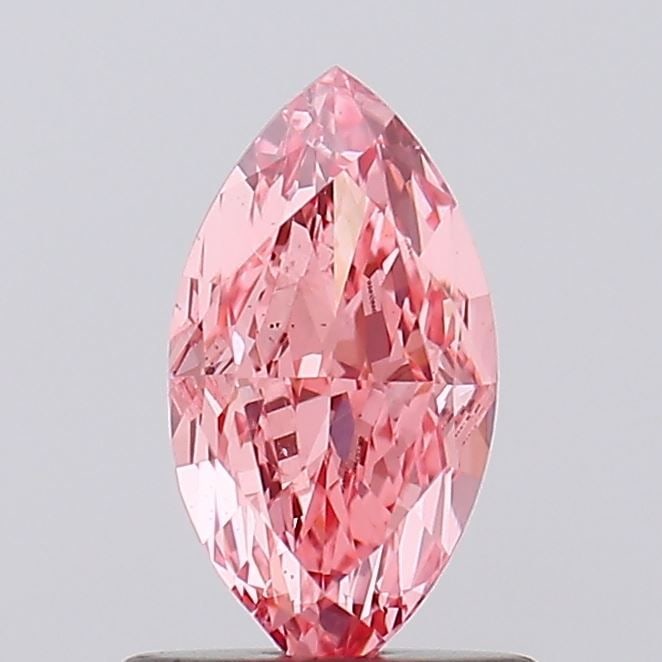 Loose Diamond - MARQUISE 1.01ct Fancy Vivid Pink VS2: Loose Diamond - MARQUISE 1.01ct Fancy Vivid Pink VS2 Source: This is a real non-mined Diamond that has been grown in a lab Shape: MARQUISE Carats: 1.01 Color: Fancy Vivid Pink Certification: IGI Video