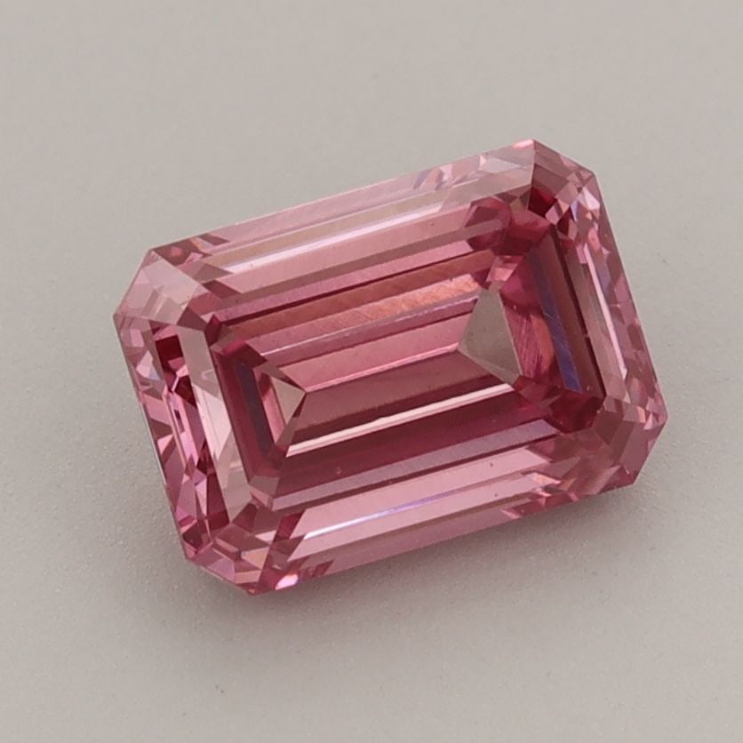 Loose Diamond - EMERALD 1.55ct Fancy Vivid Pink VVS2: Loose Diamond - EMERALD 1.55ct Fancy Vivid Pink VVS2 Source: This is a real non-mined Diamond that has been grown in a lab Shape: EMERALD Carats: 1.55 Color: Fancy Vivid Pink Certification: IGI The Di