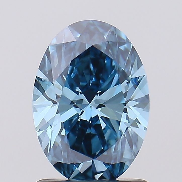 Loose Diamond - OVAL 1.03ct Fancy Vivid Blue VS2: Loose Diamond - OVAL 1.03ct Fancy Vivid Blue VS2 Source: This is a real non-mined Diamond that has been grown in a lab Shape: OVAL Carats: 1.03 Color: Fancy Vivid Blue Certification: IGI Video: