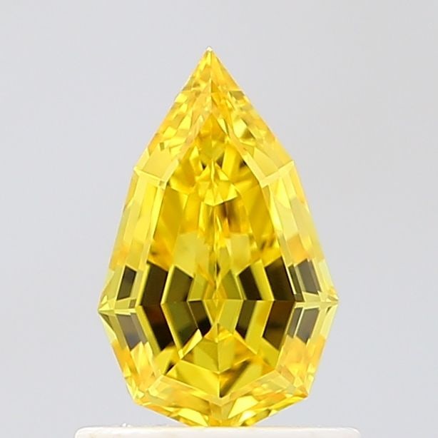 Loose Diamond - PEAR 0.72ct Fancy Vivid Yellow VVS1: Loose Diamond - PEAR 0.72ct Fancy Vivid Yellow VVS1 Source: This is a real non-mined Diamond that has been grown in a lab Shape: PEAR Carats: 0.72 Color: Fancy Vivid Yellow Certification: IGI Video: