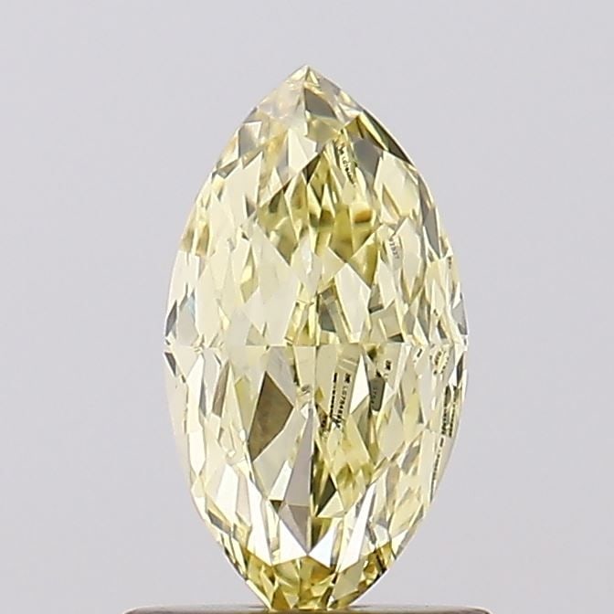 Loose Diamond - MARQUISE 1.1ct Fancy Light Yellow VVS2: Loose Diamond - MARQUISE 1.1ct Fancy Light Yellow VVS2 Source: This is a real non-mined Diamond that has been grown in a lab Shape: MARQUISE Carats: 1.1 Color: Fancy Light Yellow Certification: IGI Vi
