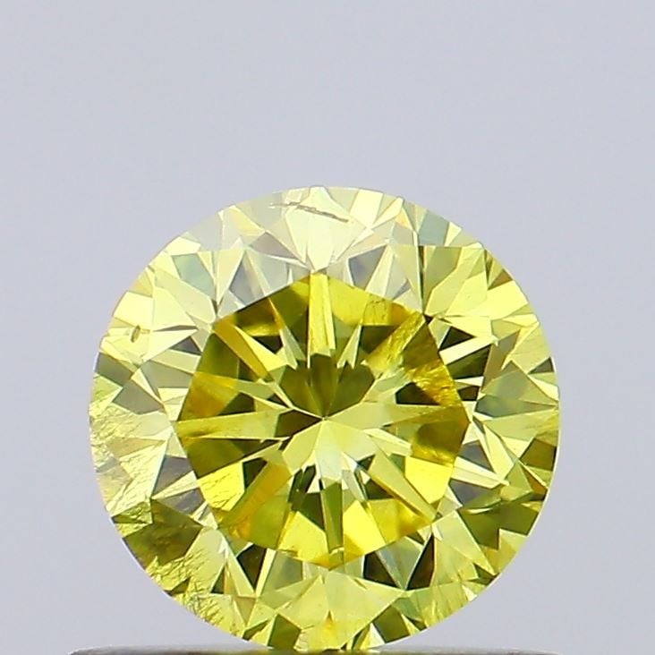 Loose Diamond - ROUND 0.7ct Fancy Vivid Yellow SI2: Loose Diamond - ROUND 0.7ct Fancy Vivid Yellow SI2 Source: This is a real non-mined Diamond that has been grown in a lab Shape: ROUND Carats: 0.7 Color: Fancy Vivid Yellow Certification: NONE Video: